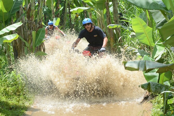 Full-Day Bali Adventure Tour with Quad Bikes and Rafting - Showers, Towels, and an Indonesian Buffet Lunch
