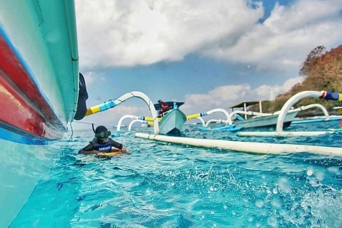 Gates of Heaven Temple and Blue Lagoon Snorkeling with All-inclusive - Snorkeling from a traditional jukung boat