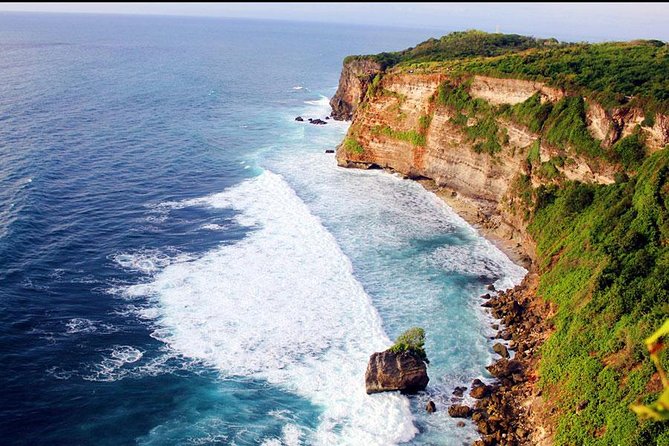 Padang-padang Beach and Kecak Firedance at Uluwatu Temple - Uluwatu Temple above the Indian Ocean