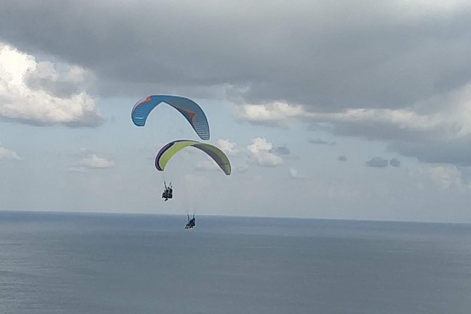 Paragliding Bali at Uluwatu Cliff with Photos/Videos - Reading the itinerary from the air