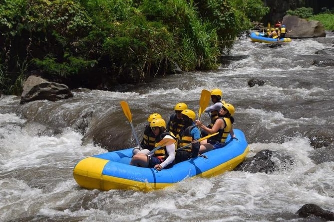 Private Tour Rafting Uluwatu Kecak Dance Sunset and Dinner in Jimbaran Bay - Uluwatu Temple at sunset