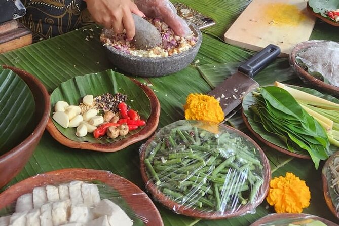 Traditional Balinese Cooking Class with Ubud Tour - Picking fresh produce before you cook
