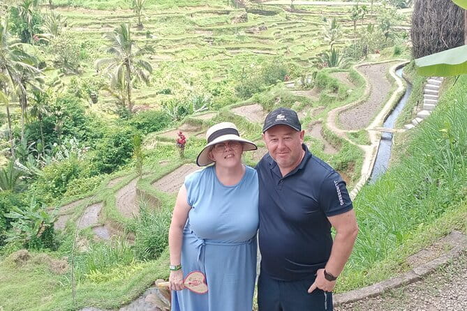 Ubud Hidden Gems Waterfall, Temple and Rice Terraces Private Tour - Kanto Lampo: A closer look at the falling water