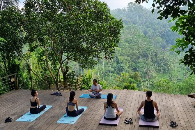 Ubud yoga, rice terrace walk and floating Breakfast tour - Traveling north from Kuta in an air-conditioned vehicle