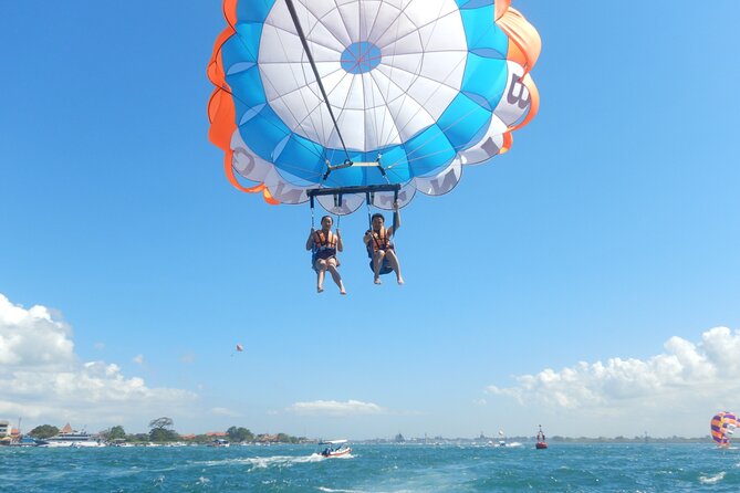 Uluwatu Temple, Beaches and Southern Bali Tour - Tanjung Benoa and the included parasailing ride